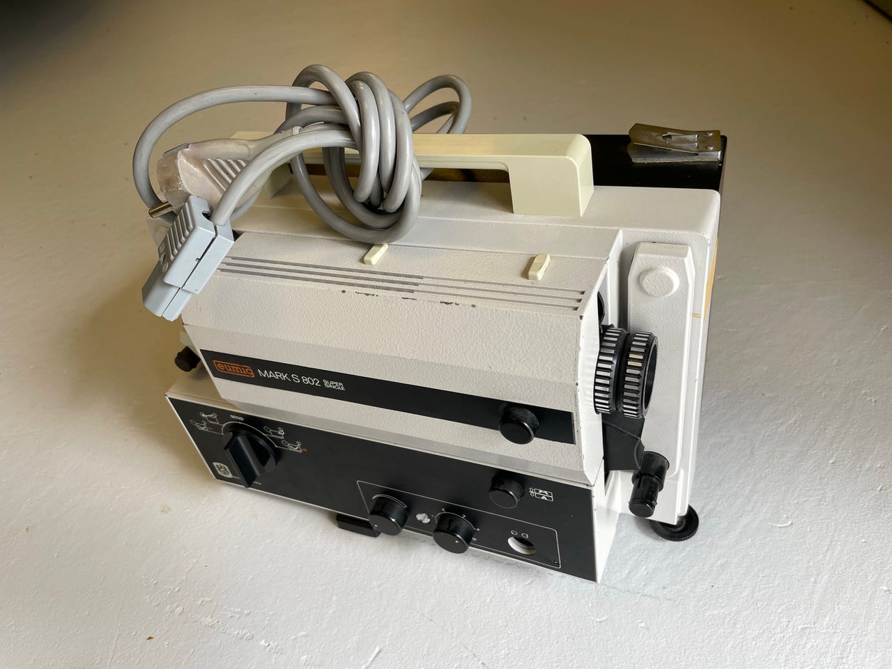publicité Advertising 1123 1978 projecteur sonore Eumig objectif traité