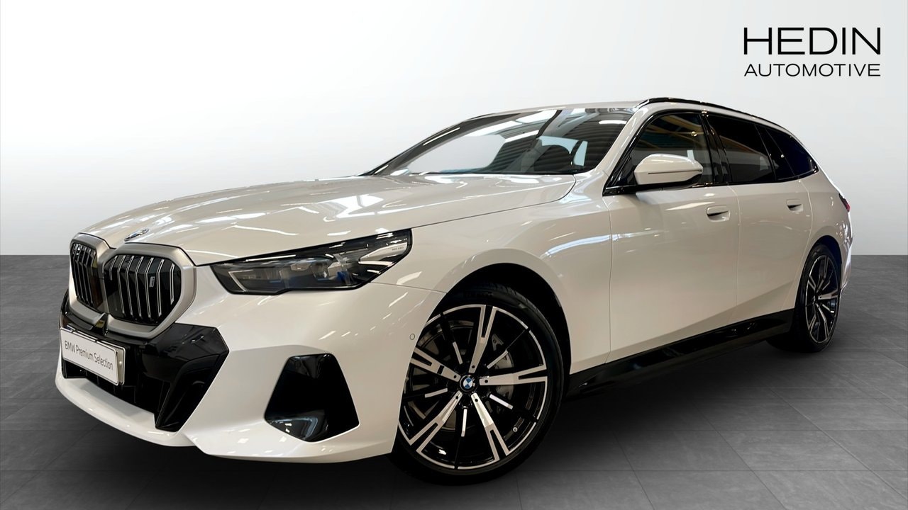 BMW i5 394 л.с.