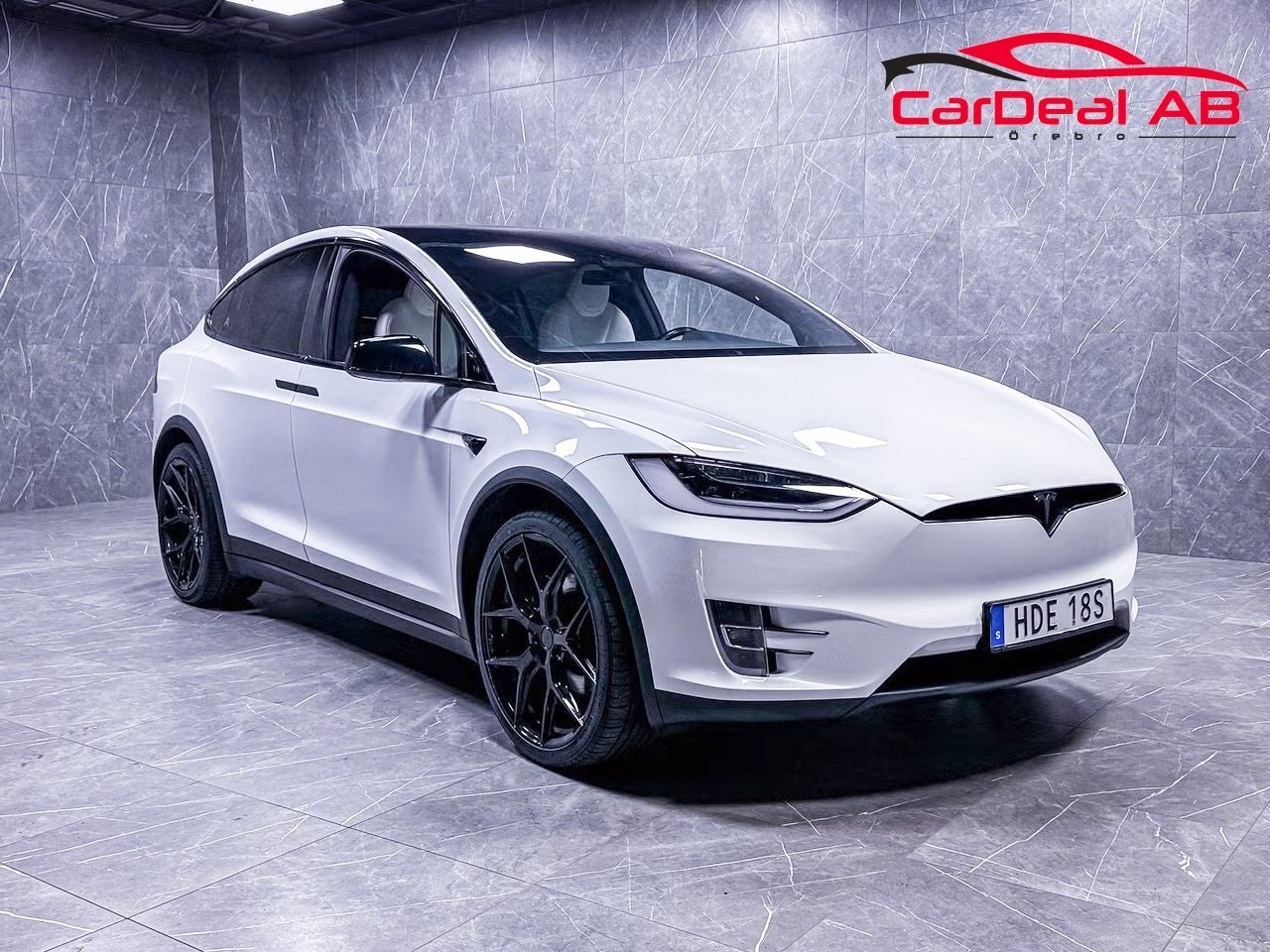 Tesla Model 611 л.с.