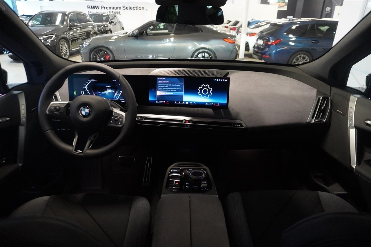 BMW iX xDrive60, 544hp, 2026