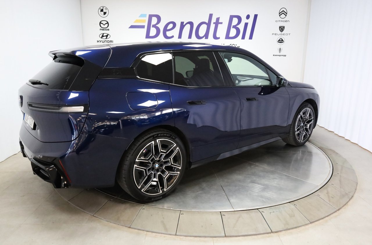 BMW iX xDrive60, 544hp, 2025