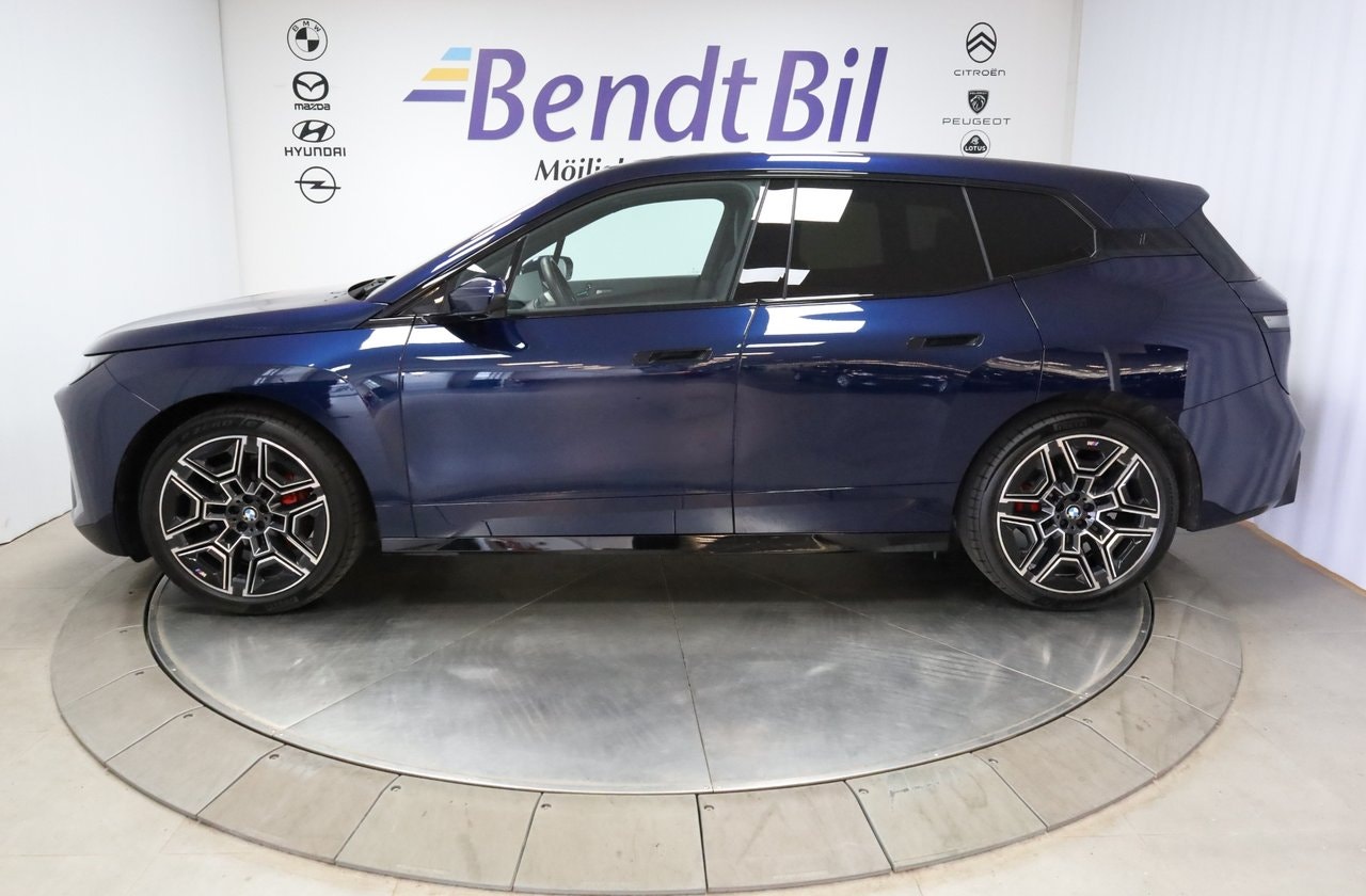 BMW iX xDrive60, 544hp, 2025