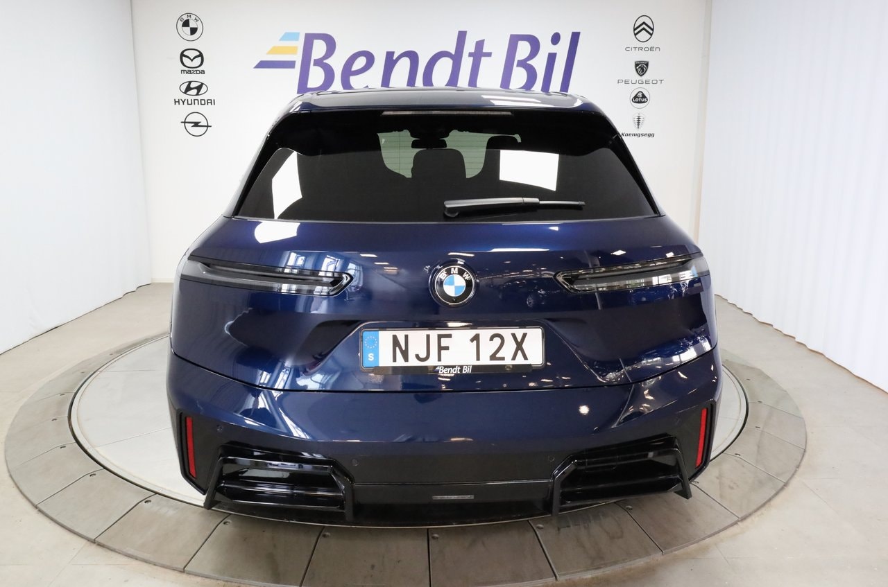 BMW iX xDrive60, 544hp, 2025