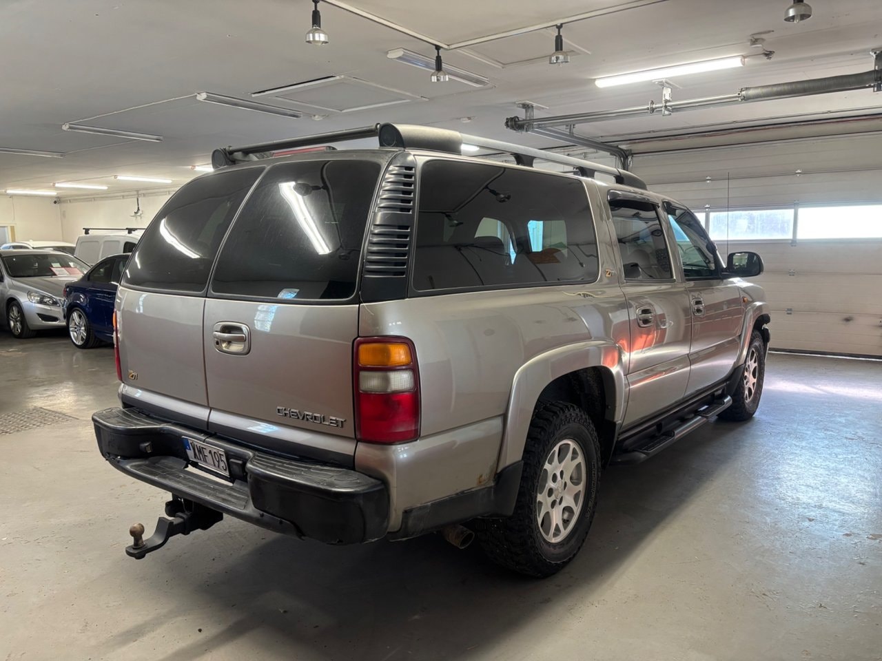Chevrolet Suburban 1500 5.3 V8 FlexFuel 4WD Hydra-Matic, 299hp, 2003