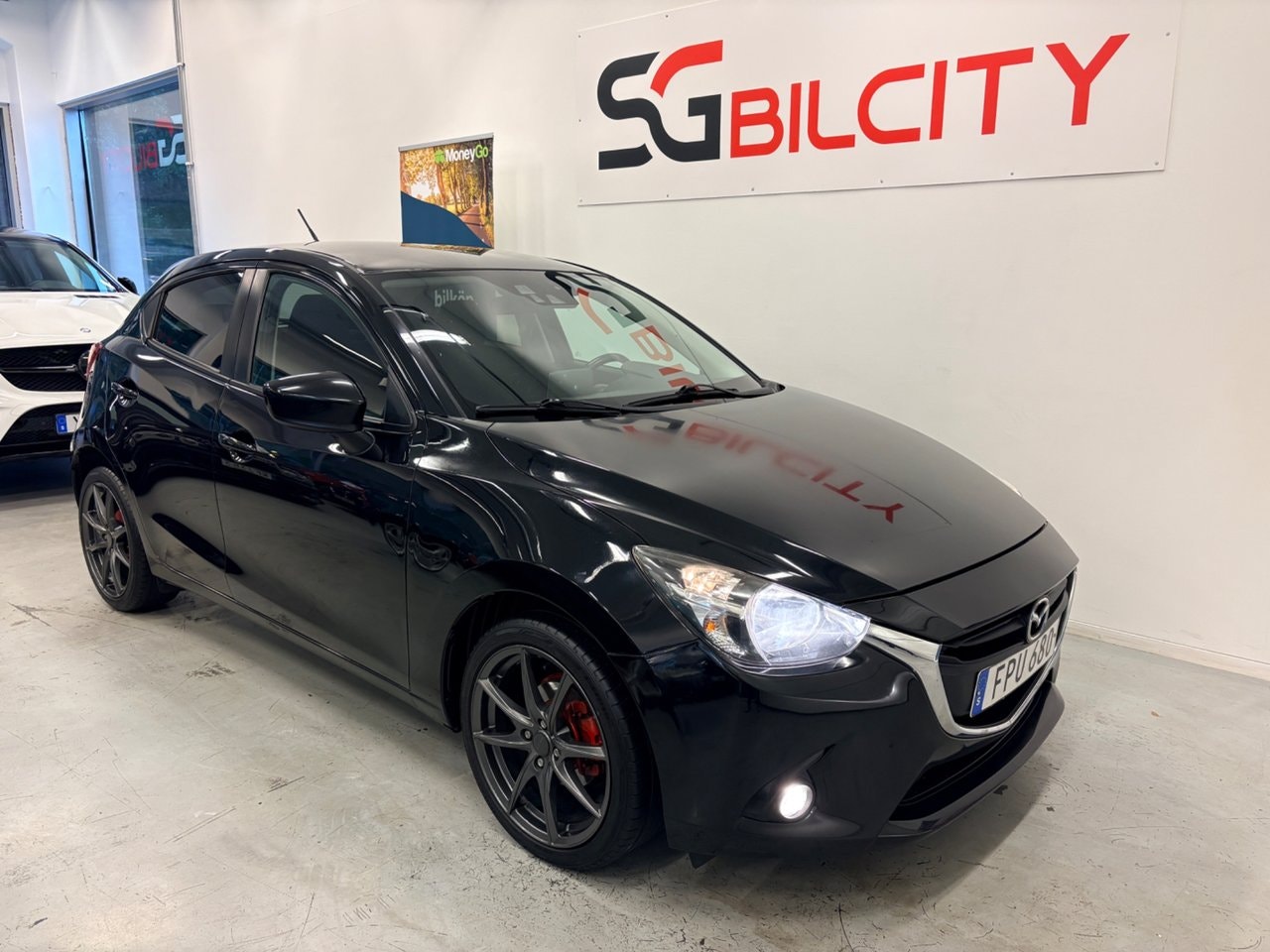 Mazda 2 90 л.с.