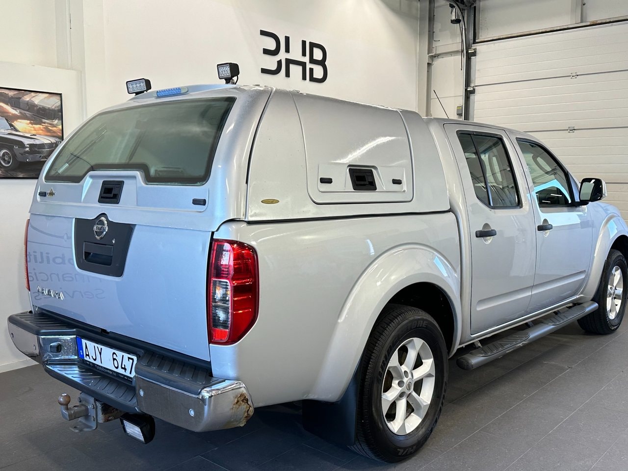 Nissan Navara 2.5 dCi Double Cab | 190 ch | BVA | Hard-top | Attelage | Régulateur de vitesse | Marchepieds | Climatisation