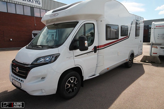 LMC Breezer Lift H 607 / Queenbed / Taksäng / Dragkrok 2 of 12
