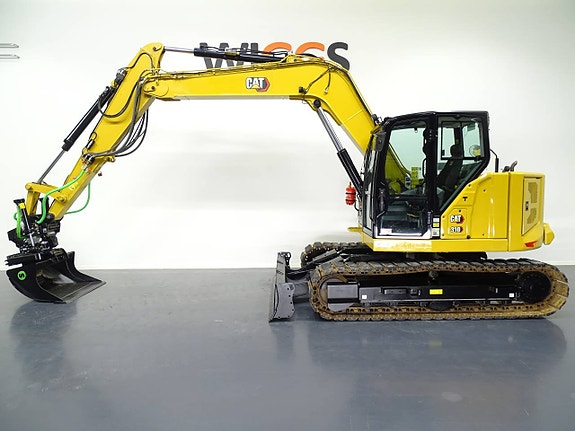 CAT 310 - 21 / Steelwrist X12 / Grip / S45 / C-Smörj