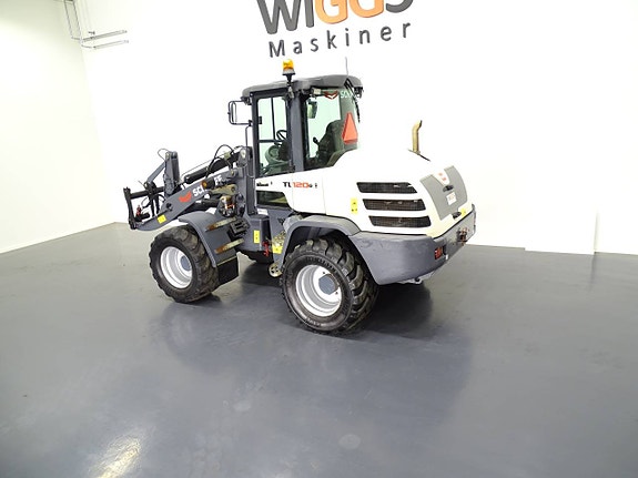 Schaeff TL120 - 18 / 36km/t / Airco / Lastdemp / C-Smörj 3 of 6