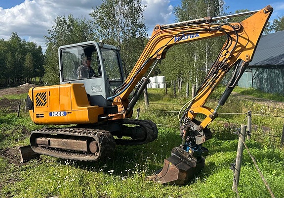 Hanix H50B med SMP rototilt bandgrävare