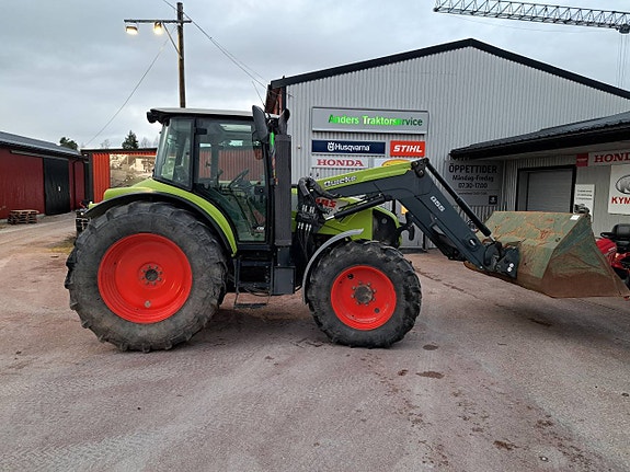 Claas Arion 410 med lastare