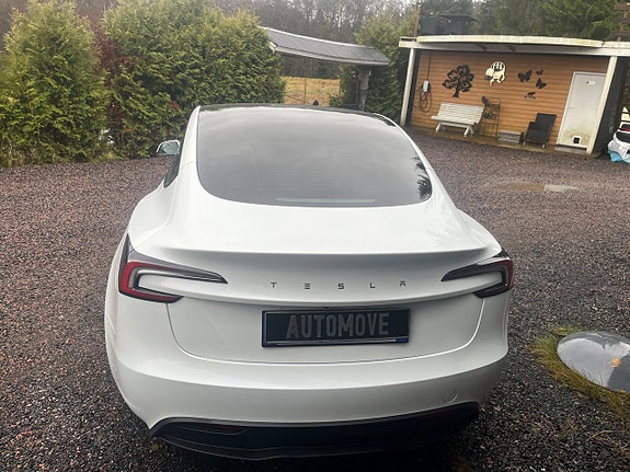 Tesla Model 3 4 of 5