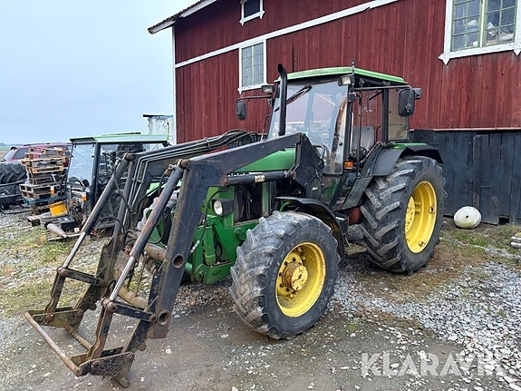 Traktor med lastare John Deere 2850