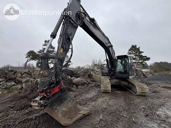 CASE CX 250 D med redskap