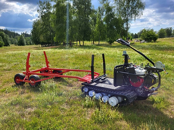 Julkampanj Järnhäst självavlastande timmervagn på köpet