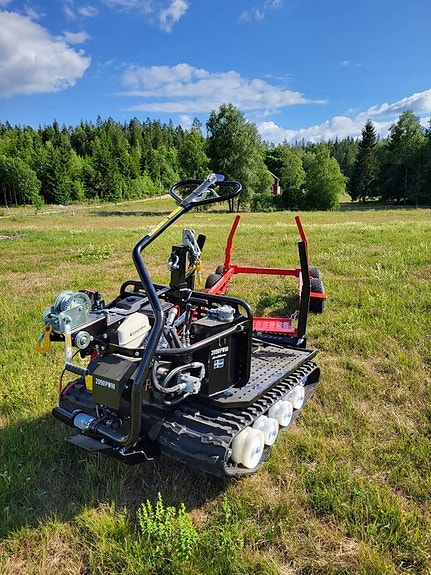 Julkampanj Järnhäst självavlastande timmervagn på köpet