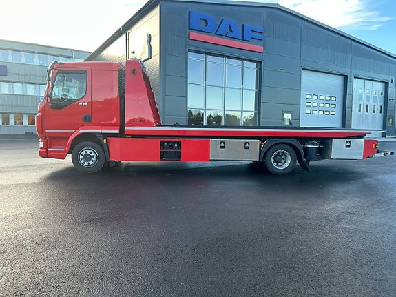 DAF XB 210 - Flakbärgare