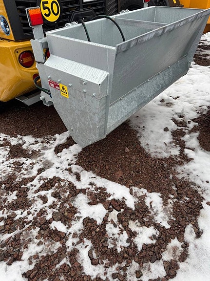 Siringe självlastande sandspridare