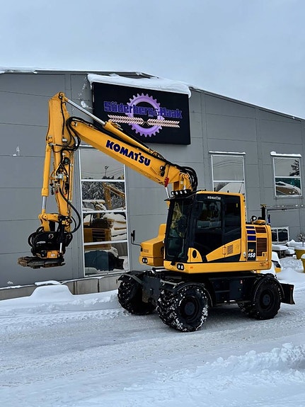 Komatsu PW158 med kärra