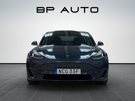 Tesla Model 3 4 of 5