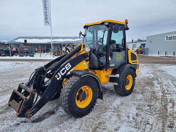 JCB 409, 40km/h, 1.900tim SMS fäste