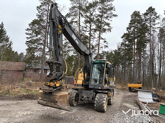 Hjulgrävmaskin-VOLVO EW160C med släp