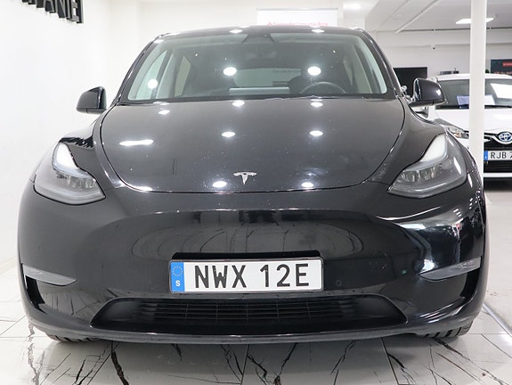 Tesla Model Y 2 of 5