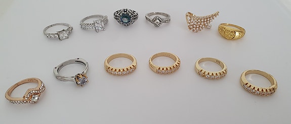 12 stycken 925 Blandat Silver Ringar med olika designer.