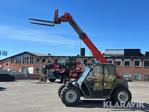 Teleskoplastare Merlo P25.6 med manuella gaff