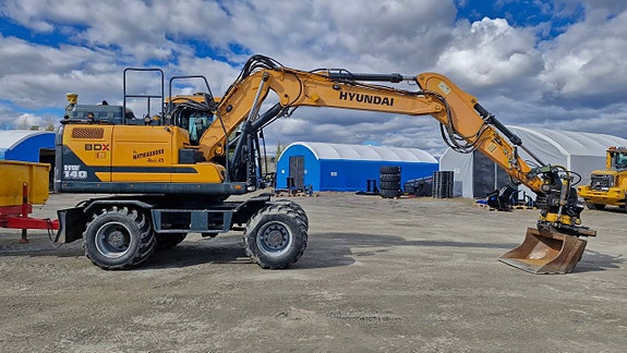 Hyundai HW140 Hjulgrävmaskin med Möre vagn