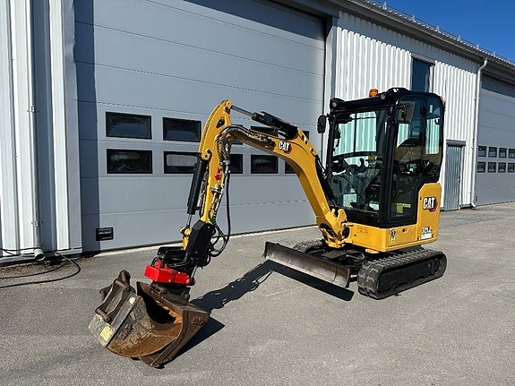 CAT 301.8 minigrävare med rotortilt och skopor 4 of 5