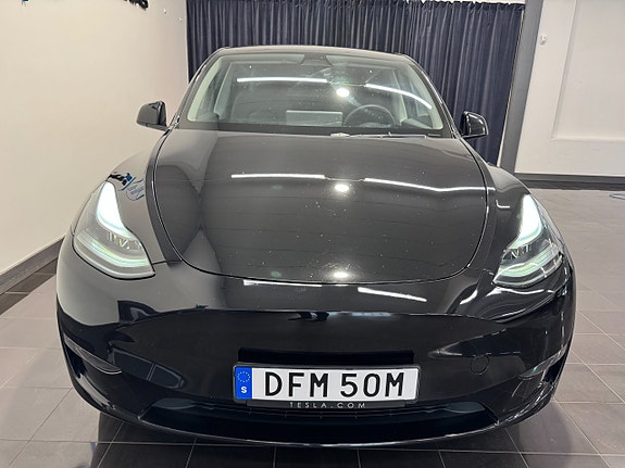 Tesla Model Y 2 of 5