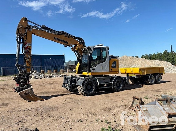 Liebherr A 914 Compact Litronic Hjulgrävare med vagn och...