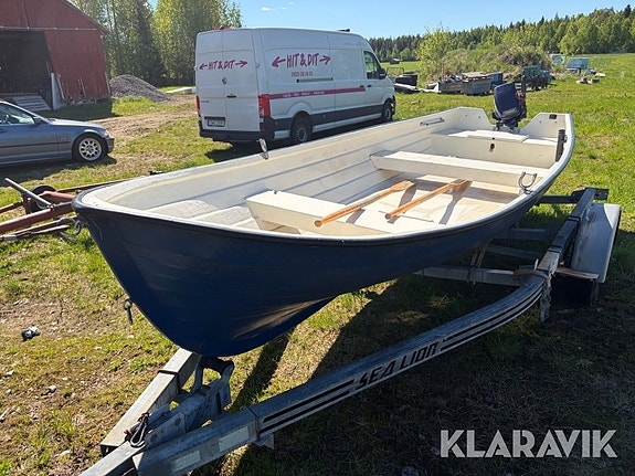 Båt med upptagningsvagn