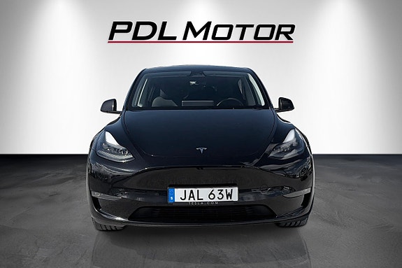 Tesla Model Y 2 of 5