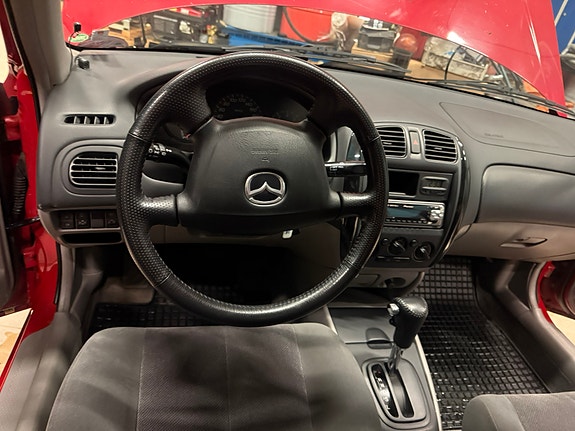 Mazda 323S 4 of 4