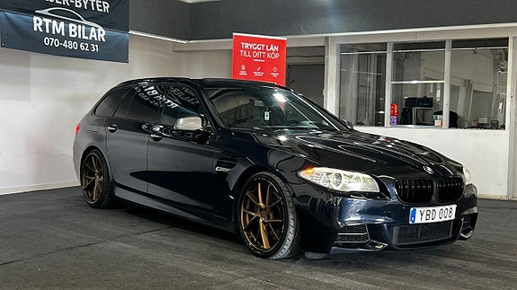 BMW M550d 3 of 5