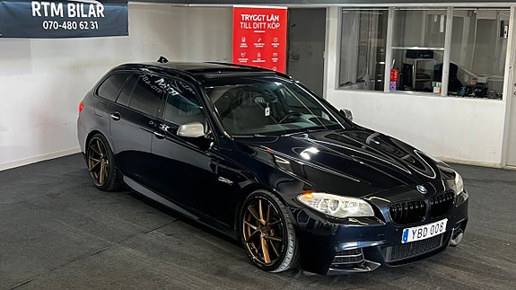 BMW M550d 4 of 5