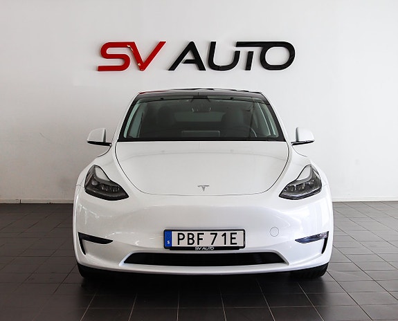 Tesla Model Y 2 of 5