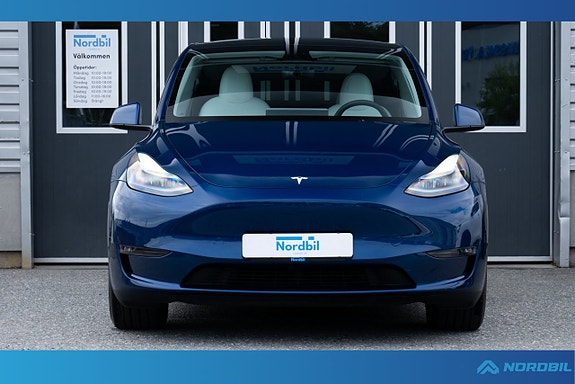 Tesla Model Y 3 of 5