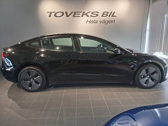 Tesla Model 3 4 of 5