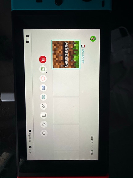 Nintendo Switch spelkonsol med neonröda och neonturkosa Joy-Con image 5
