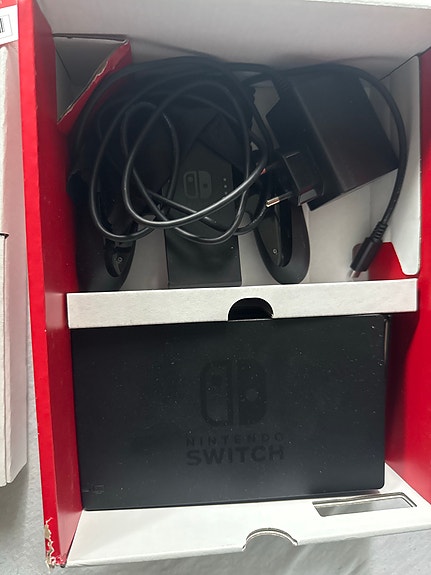 Nintendo Switch spelkonsol med neonröda och neonturkosa Joy-Con image 2