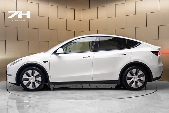 Tesla Model Y 2 of 5
