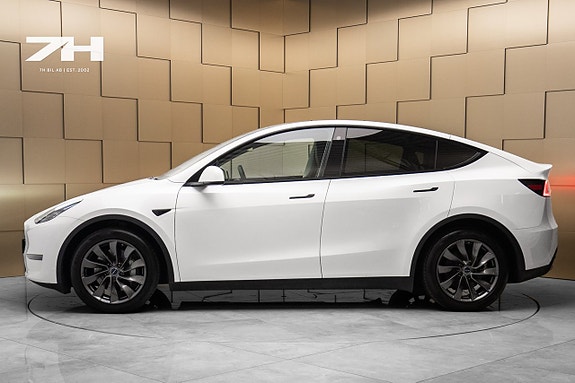 Tesla Model Y 2 of 5