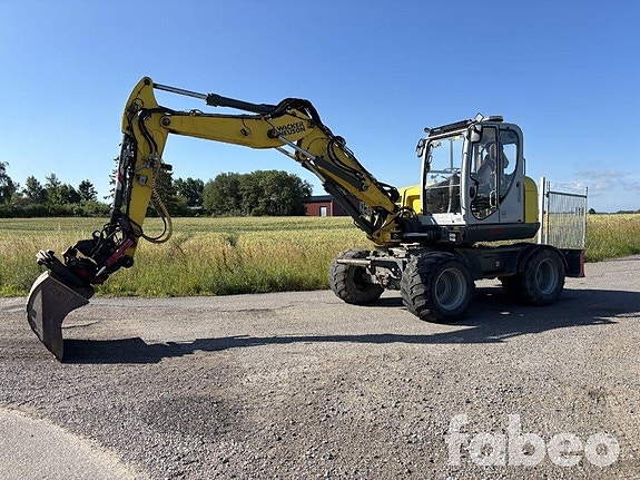 Wacker Neuson EW100  Hjulgrävare med massa redskap (136178)