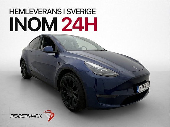 Tesla Model Y 4 of 5