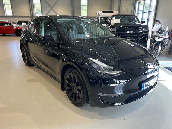 Tesla Model Y 2 of 5