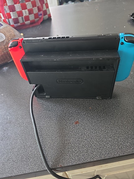 Nintendo Switch spelkonsol neon röd/blå image 2
