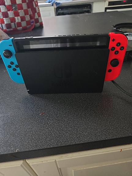 Nintendo Switch spelkonsol neon röd/blå